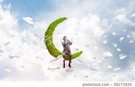 Young man in sky on moon do not want to see anything Young man in sky on moon do not want to see anything 36273826