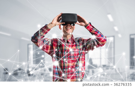 Guy wearing checked shirt and virtual mask demonstrating some emotions Guy wearing checked shirt and virtual mask demonstrating some emotions 36276335