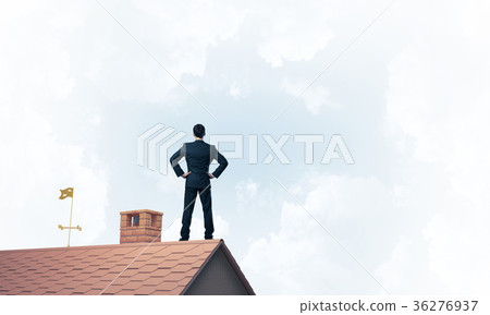 Mister boss on brick roof with arms akimbo. Mixed media Mister boss on brick roof with arms akimbo. Mixed media 36276937