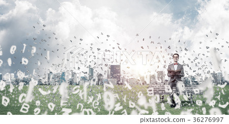 Young businessman or student studying the science and symbols fl Young businessman or student studying the science and symbols fl 36276997