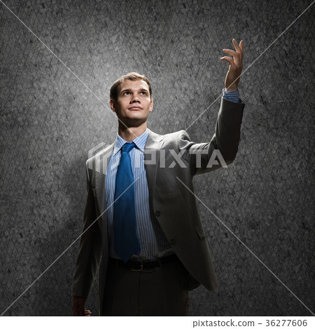 Gesturing businessman 36277606