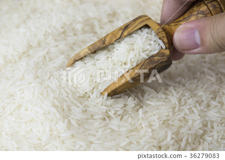 Jasmine rice in a wooden bowl Jasmine rice in a wooden bowl 36279083