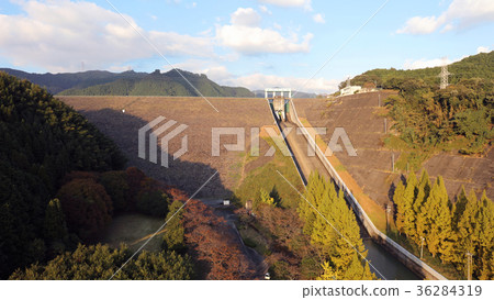 Aerial view Dam illuminated by the sunset (Asakura City Terauchi Dam) 36284319