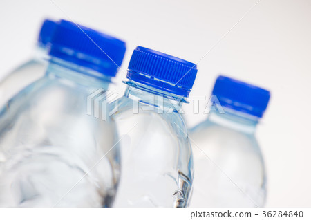 Plastic bottles of water isolated on white Plastic bottles of water isolated on white 36284840