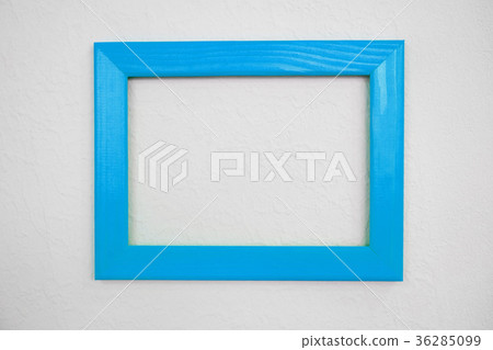 empty wooden frame on composition wall as concept 36285099