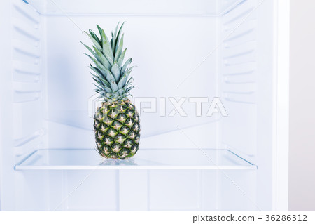 Pinepple fruit in clean refrigerato inside Pinepple fruit in clean refrigerato inside 36286312