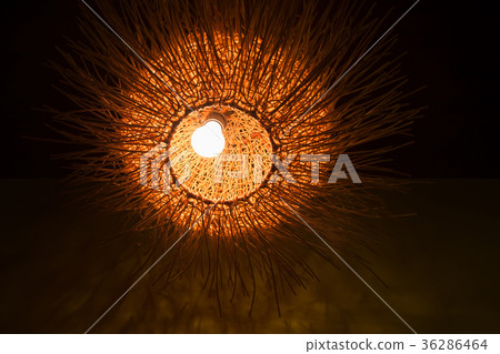 Decorative wicker lamp in dark room. Asian decor 36286464