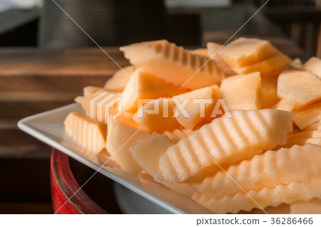 Close up slice of fresh cantaloupe Close up slice of fresh cantaloupe 36286466