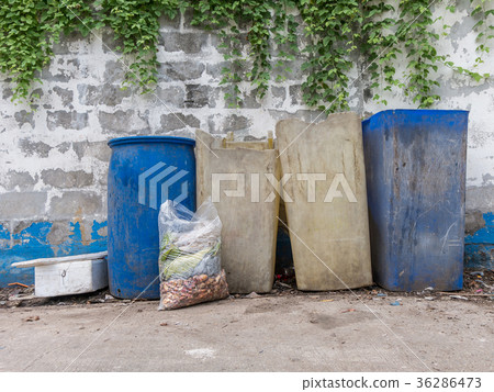 Garbage bags with food waste at dumpsters Garbage bags with food waste at dumpsters 36286473