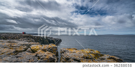 People on the cliffs in Doolins Bay People on the cliffs in Doolins Bay 36288038