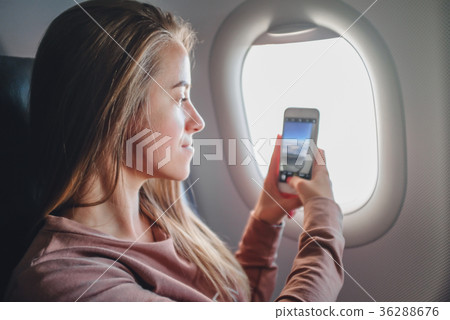 Girl in arplaine make photo Girl in arplaine make photo 36288676