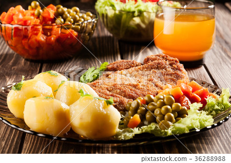 Breaded chop and potatoes Breaded chop and potatoes 36288988