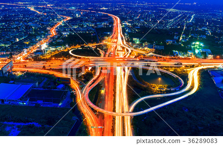 Aerial view of cityscape and traffic on highway 36289083