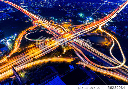 Aerial view of cityscape and traffic on highway  36289084