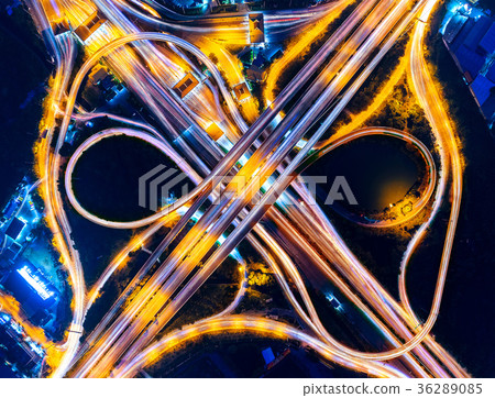 Aerial view of cityscape and traffic on highway  36289085