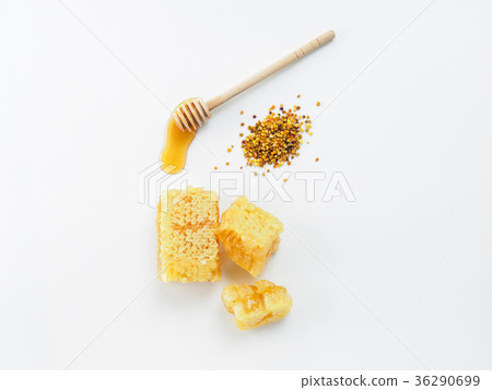 Honey with dipper, honeycomb and bee pollen on 36290699