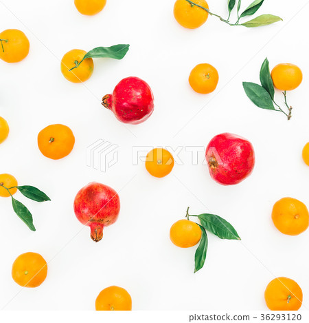 Citrus and red garnet isolated on white background 36293120