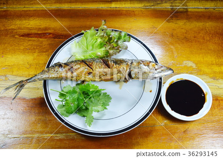 fried pacific mackerel and vegetable with sauce 36293145