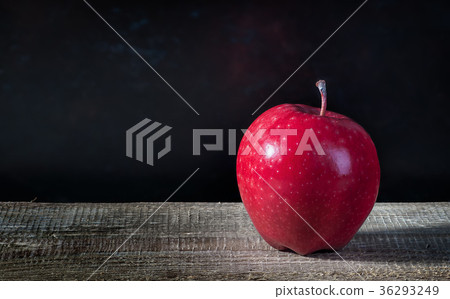 Single apple on a wooden table Single apple on a wooden table 36293249