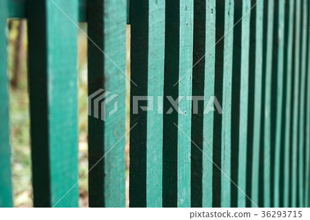 Bright green wood wooden fence gate, close up shot Bright green wood wooden fence gate, close up shot 36293715