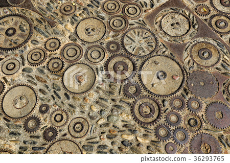 Floor with pattern from pebbles and metal details 36293765