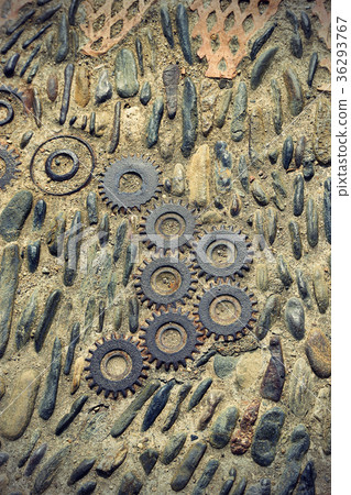 Floor with pattern from pebbles and metal details 36293767