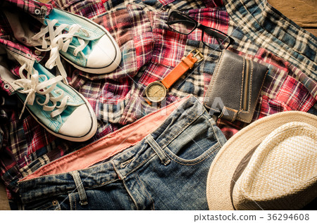 costume and accessories for men on a wooden floor. 36294608