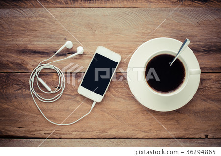 smartphone with blank screen headphone coffee cup  36294865