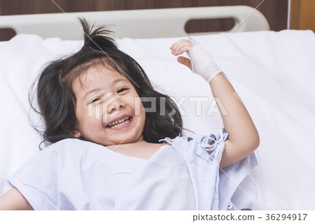 Cute Patien Little Asian Girl Smile on Bed in hospital. Cute Patien Little Asian Girl Smile on Bed in hospital. 36294917