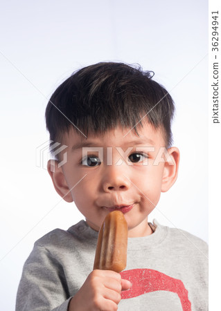 Portiaits Cute Little Asian Boy Eating ice-Cream. Portiaits Cute Little Asian Boy Eating ice-Cream. 36294941