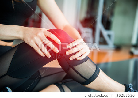 Sports injury at knee in fitness training gym 36295536