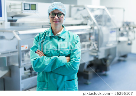 the operator controls the machine in the factory the operator controls the machine in the factory 36296107