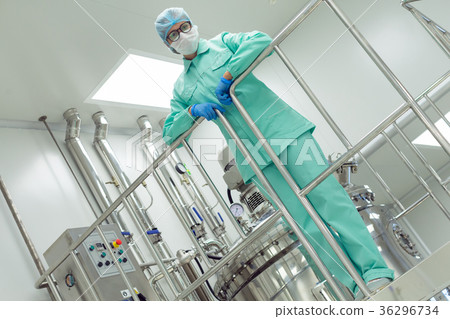the operator controls the machine in the factory the operator controls the machine in the factory 36296734