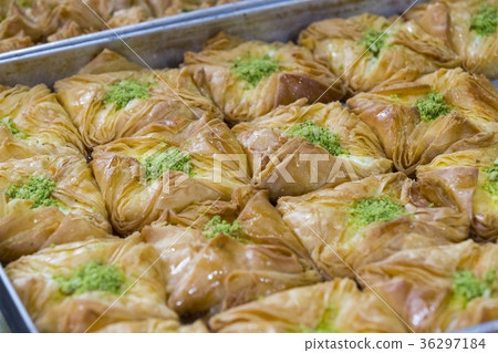 Oriental sweets baked on the market close-up photo 36297184