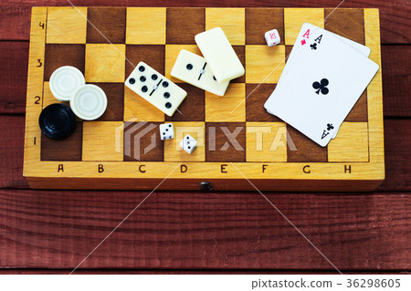 Various board games chess board, playing cards 36298605