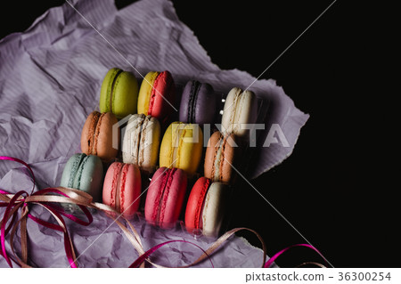 Colorful macaroons set on black background. Food Colorful macaroons set on black background. Food 36300254