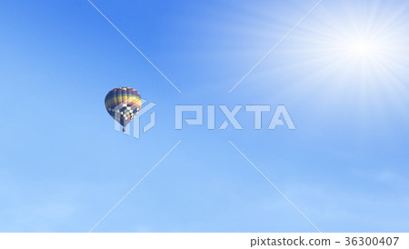 Colorful hot air balloons flying over 36300407