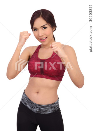 Healthy woman exercises with boxing. Healthy woman exercises with boxing. 36303835