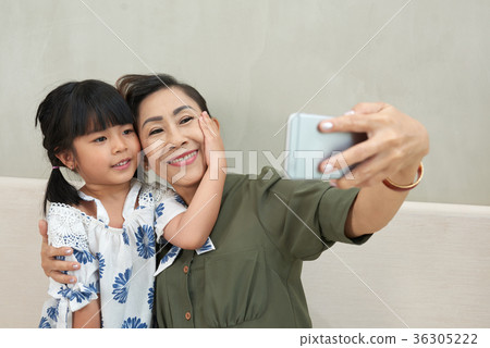 Granddaughter and grandmother 36305222