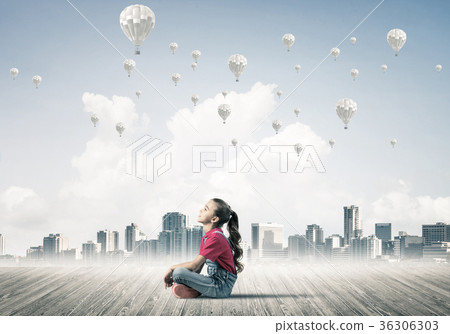 Concept of careless happy childhood with girl dreaming about som Concept of careless happy childhood with girl dreaming about som 36306303