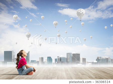 Concept of careless happy childhood with girl dreaming about something 36306514