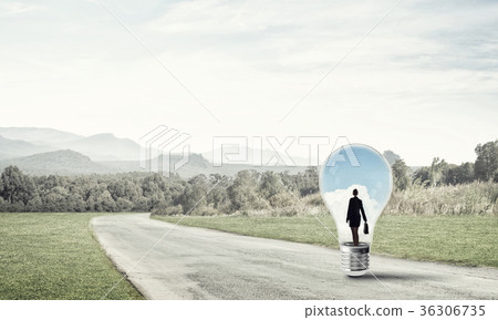 Businesswoman inside light bulb 36306735