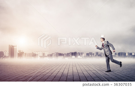 King businessman in elegant suit running and business center at 36307035
