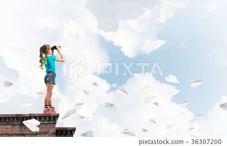 Concept of careless happy childhood with girl of school age looking in future Concept of careless happy childhood with girl of school age looking in future 36307200