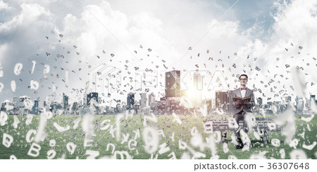 Young businessman or student studying the science and symbols fl Young businessman or student studying the science and symbols fl 36307648