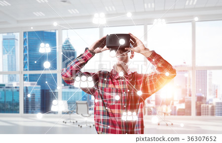 Guy wearing checked shirt and virtual mask demonstrating some emotions Guy wearing checked shirt and virtual mask demonstrating some emotions 36307652