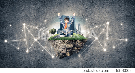 Cute boy of school age with book exploring this great world 36308003