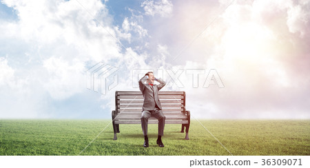 Young man in suit in park dont want to hear anything Young man in suit in park dont want to hear anything 36309071