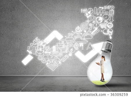 Businesswoman trapped in bulb Businesswoman trapped in bulb 36309259