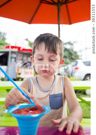 Child Eating Shave Ice in Hawaii Child Eating Shave Ice in Hawaii 36311553